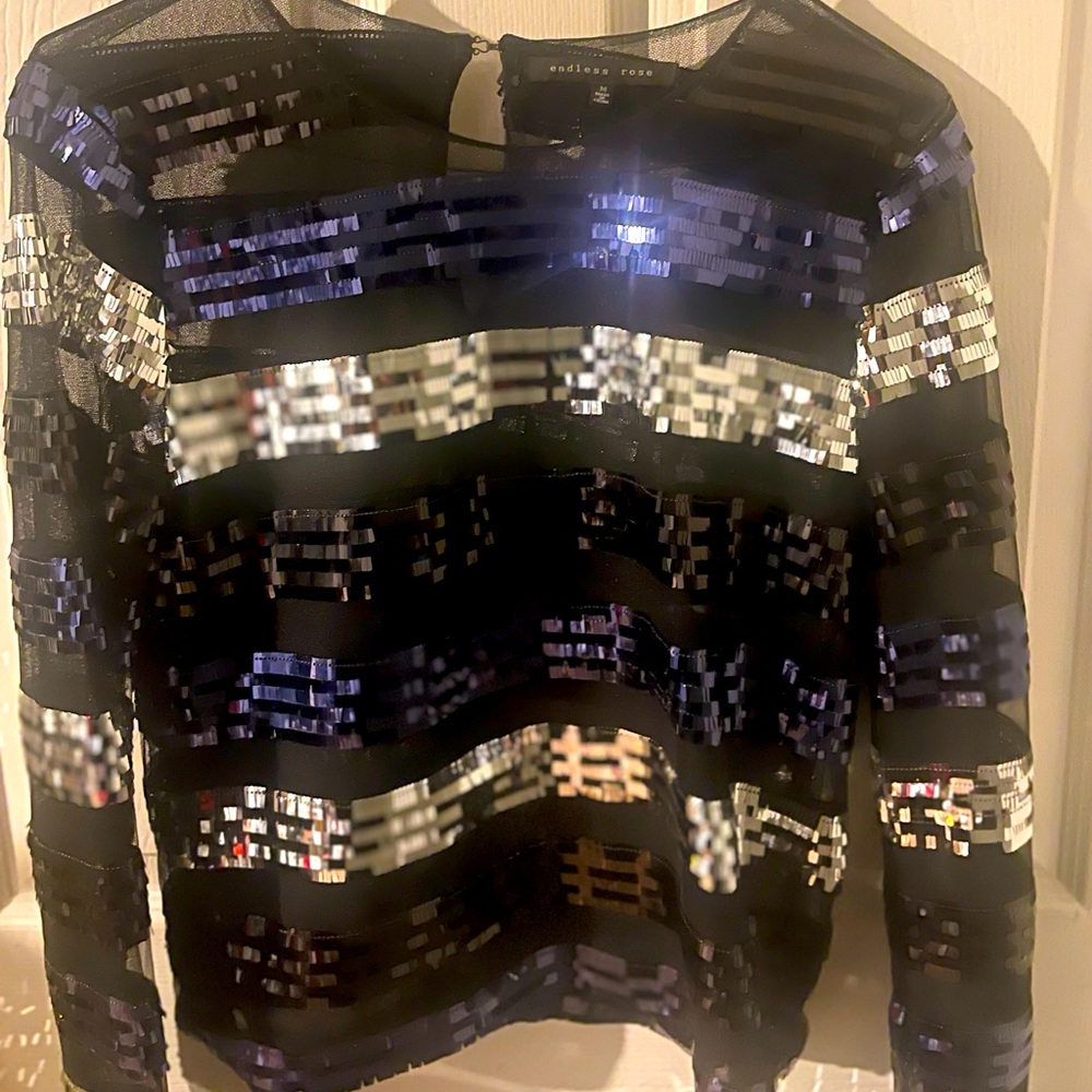 Multicolored sequin and sheer striped top